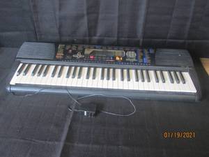 lot 184 image: YAMAHA PORTATONE STEREO SAMPLING PIANO