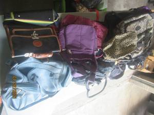 lot 295 image: GENEROUS AMOUNG OF BACKPACKS, CARRY BAGS AND PURSES