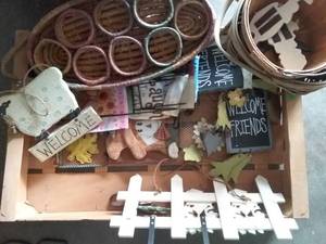 lot 67 image: Crate Full of Baskets, Wood Farmhouse Signs, and Plant Flags