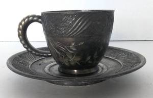 lot 38 image: Antique Victorian Pewter Finish Teacup and Saucer