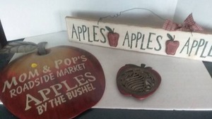 lot 178 image: Apple Signs (1 Metal, 1 Wood) and Cast Iron Trivet
