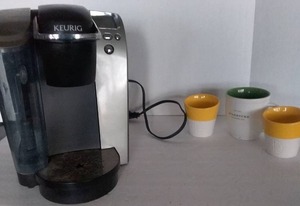 lot 192 image: Starbucks Coffee Cups and Keurig Coffee Maker