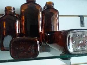 lot 238 image: Vintage Amber Apothecary Bottles(6 Large and 6 Small)