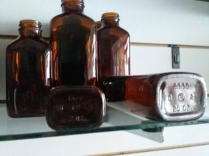 lot 239 image: Vintage Amber Apothecary Bottles(6 Large and 6 Small)