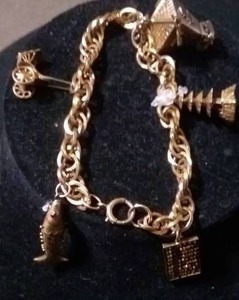 lot 2 image: 14k Gold Asian Themed Charm Bracelet, weight about 21 grams