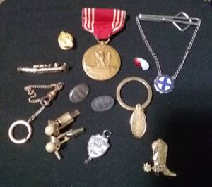 lot 251 image: Medals, Pins, and more including WWII Medal of Good Conduct and Ruptured Duck WWII Coat Button