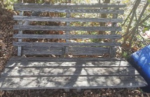 lot 298 image: Vintage Fold up Wood Bench and Cherub Concrete Yard Art