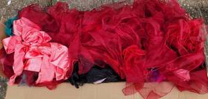 lot 9 image: BOX LOT OF CHAIR SASHES IN ASSORTED STYLESCOLORS AS SHOWN. LARGE QUANTITY. BOX MEASURES APPROX. 48 L x 15 D x 9 H AND IS PACKED FULL.