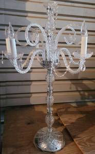 lot 21 image: LARGE GLASS CENTERPIECE WITH CHROME METAL ACCENTS IN STYLECOLORCONDITION SHOWN. MEASURES APPROX. 39 H x 26.5 WIDE (EXTENDED).