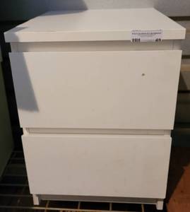 lot 49 image: WOODEN 2-DRAWER CABINET IN STYLECOLORCONDITION SHOWN. APPROX. 16 W x 19 D x 21.75 H.