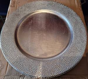 lot 92 image: LOT OF 12 NEW TABLE CHARGERS IN STYLECOLOR AS SHOWN. EACH 13 DIA. (YOUR BID X 12)