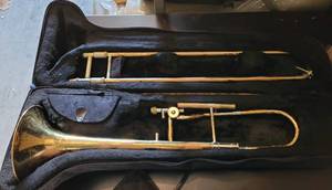lot 115 image: TROMBONE WITH CASE AS SHOWN.