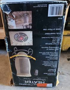 lot 137 image: DESIGNER SERIES ROTATING CERAMIC HEATER MODEL 6435 WITH BOX IN CONDITION SHOWN.