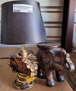 lot 148 image: DECORATIVE LAMP AND ELEPHANT CANDLE HOLDER AS SHOWN.