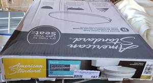 lot 187 image: AMERICAN STANDARD ROUND FRONT TOILET SEAT IN BOX AS SHOWN.