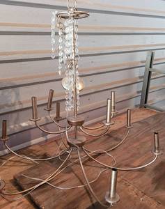 lot 219 image: 10-LIGHT CHANDELIER IN STYLECOLORCONDITION SHOWN.