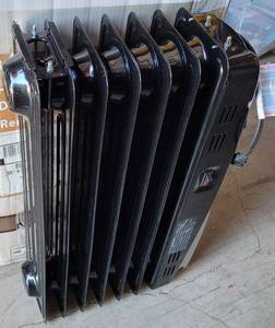 lot 245 image: ECO HOUZNG OIL-FILLED RADIATOR HEATER IN STYLECOLORCONDITION SHOWN. SEE PICTURES.
