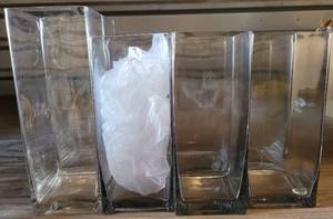 lot 283 image: LOT OF 8 SQUARED CLEAR GLASS VASES IN ASSORTED SIZES AS SHOWN. (2) 11.25 H x 4 W (4) 9.25 H x 4 W. (YOUR BID X 8)