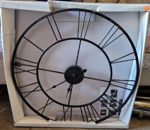 lot 289 image: METAL WALL CLOCK IN STYLECOLORCONDITION SHOWN.