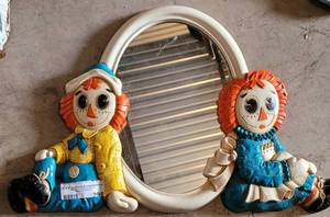 lot 298 image: VINTAGE 1977 RAGGEDY ANN AND ANDY MIRROR IN STYLECOLORCONDITION SHOWN. APPROX. 20.5 W x 13.25 H.