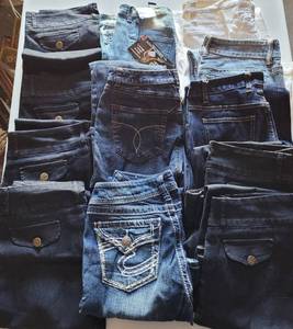 lot 341 image: LOT OF 12 PAIR OF JEANS IN ASSORTED SIZESSTYLESCOLORS AS SHOWN. SOME HAVE TAGS. (YOUR BID X 12)