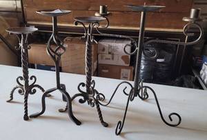 lot 316 image: LOT OF 4 METAL CANDLE HOLDERS IN ASSORTED STYLES AS SHOWN. (YOUR BID X 4)