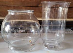 lot 350 image: LOT OF 2 CLEAR GLASS VASES IN STYLECOLORCONDITION SHOWN. (1) 10 H x 10 W (1) 12 H x 6.75 DIA. (YOUR BID X 2)