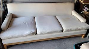 lot 356 image: WOODEN FRAME AND UPHOLSTERED CUSHIONED TOP SOFA IN STYLECOLORCONDITION SHOWN.