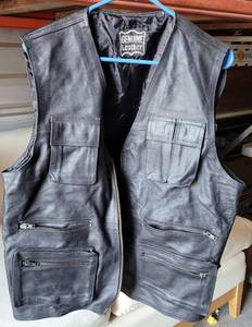 lot 375 image: GENUINE LEATHER VEST IN STYLECOLORCONDITION SHOWN.