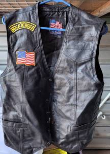 lot 377 image: LEATHER VEST IN STYLECOLORCONDITION SHOWN.