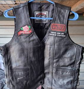 lot 379 image: RIVER ROAD LEATHER VEST IN STYLECOLORCONDITION SHOWN.