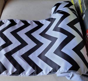 lot 389 image: ROLL OF SATIN FABRIC WITH CHEVRON DESIGN AS SHOWN.