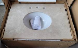 lot 407 image: MARBLE VANITY TOP WITH SINK #31998 IN BOX AS SHOWN. APPROX. 31 x 22.