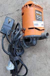 lot 449 image: RIDGID WETDRY VAC PUMP ACCESSORY MODEL VP2000 AS SHOWN.