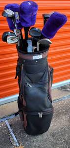 lot 458 image: ALIEN GOLF BAG WITH ASSORTED CLUBS IN STYLESSIZES SHOWN.