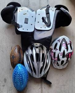 lot 459 image: FOOTBALL SHOULDER PADS AND MORE AS SHOWN.