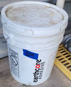 lot 509 image: EARTHCORE ADHESIVE AS SHOWN.