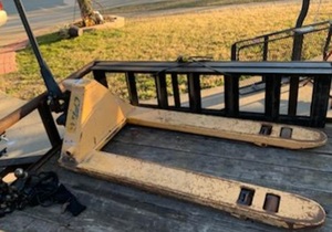 lot 404 image: PALLET JACK WITH 48 FORKS IN WORKING CONDITION AS SHOWN.