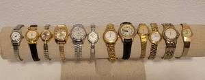 lot 524 image: LOT OF 12 LADIES WRIST WATCHES IN VARIOUS BRANDSSTYLESCOLRS SHOWN. INCLUDES TIMEX, LIZ CLAIBORNE, BULOVA, ELGIN, ANNE KLEIN AND MORE.