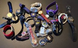 lot 528 image: LOT OF ASSORTED WATCHES IN STYLESCOLORSCONDITION SHOWN. MOSTLY FOR PARTS ANDOR REPAIRS.