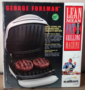 lot 25 image: George Formans Lean Mean Fat Reducing Grilling Machine