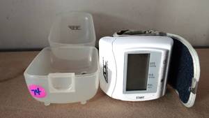 lot 74 image: AOC PORTABLE WRIST BLOOD PRESSURE MONITOR WITH CASE