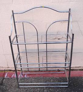 lot 80 image: STAINLESS BATHROOM STORAGE SHELF