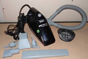 lot 82 image: PORTABLE BLACK AND DECKER VACUUM WITH ATTACHMENTS AND HANDY CARRY BAG