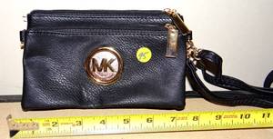 lot 95 image: MICHAEL KORS CLUTCH PURSE
