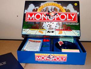 lot 140 image: MONOPOLY DELUXE EDITION BOARD GAME
