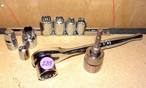 lot 239 image: ASSORTMENT OF SOCKETS AND RACHET WRENCH