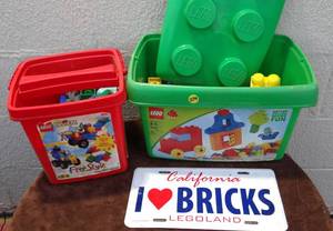 lot 274 image: ASSORTMENT OF LEGOS AND I LOVE BRICKS SEALED LICENSE PLATE