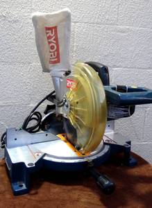 lot 4 image: Ryobi 10 inch Compound Miter Saw. Great Condition