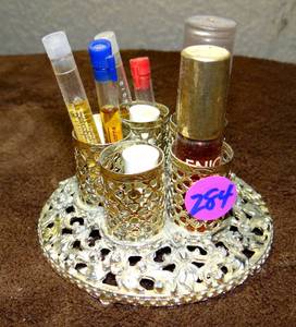 lot 284 image: ORNATE PERFUME HOLDER WITH SAMPLES